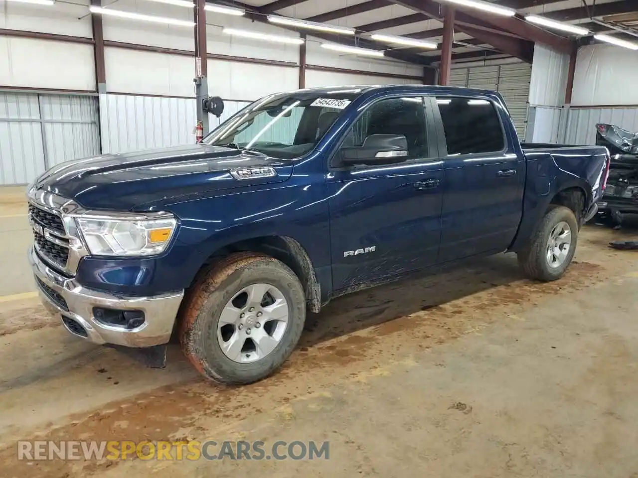 1 Photograph of a damaged car 1C6SRFFTXNN130677 RAM 1500 2022