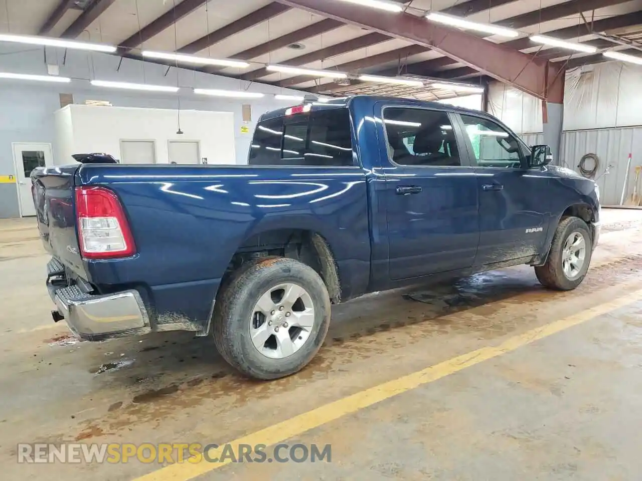 3 Photograph of a damaged car 1C6SRFFTXNN130677 RAM 1500 2022