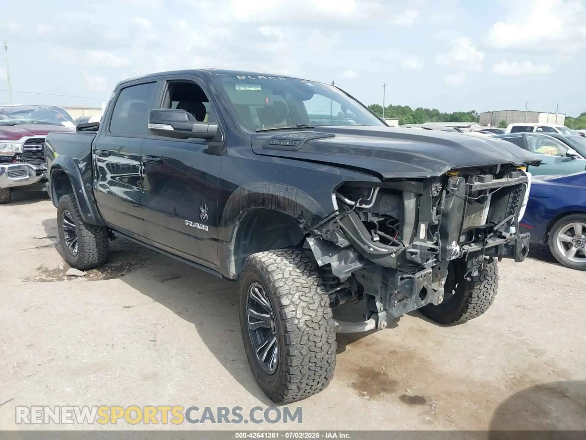 1 Photograph of a damaged car 1C6SRFFTXNN135975 RAM 1500 2022