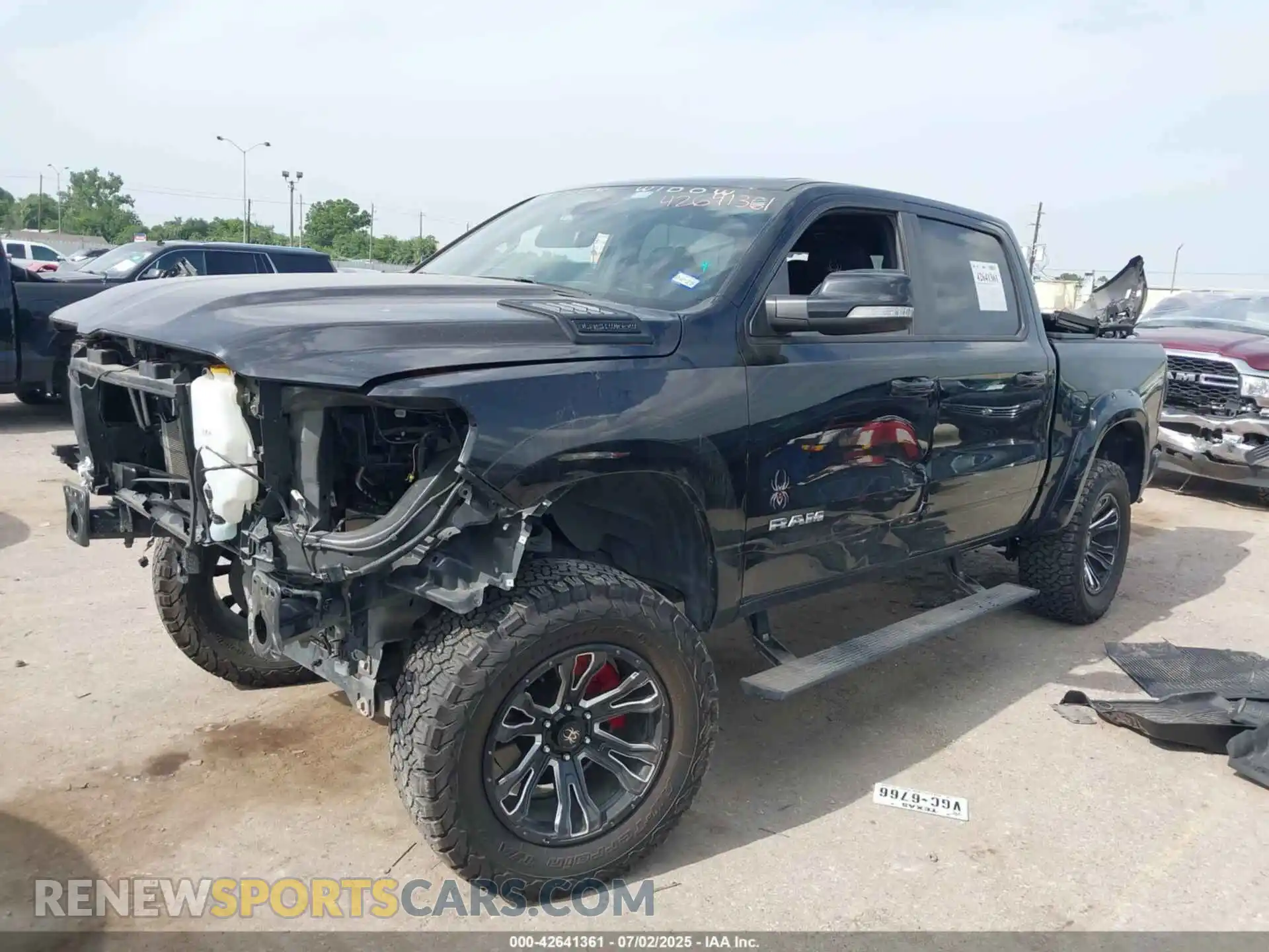 2 Photograph of a damaged car 1C6SRFFTXNN135975 RAM 1500 2022