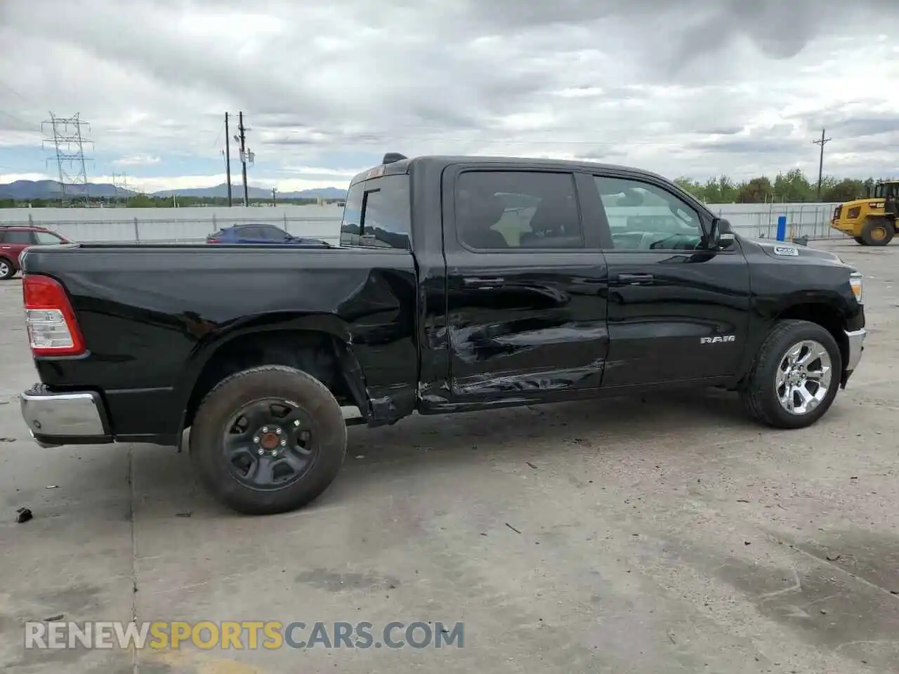 3 Photograph of a damaged car 1C6SRFFTXNN141484 RAM 1500 2022