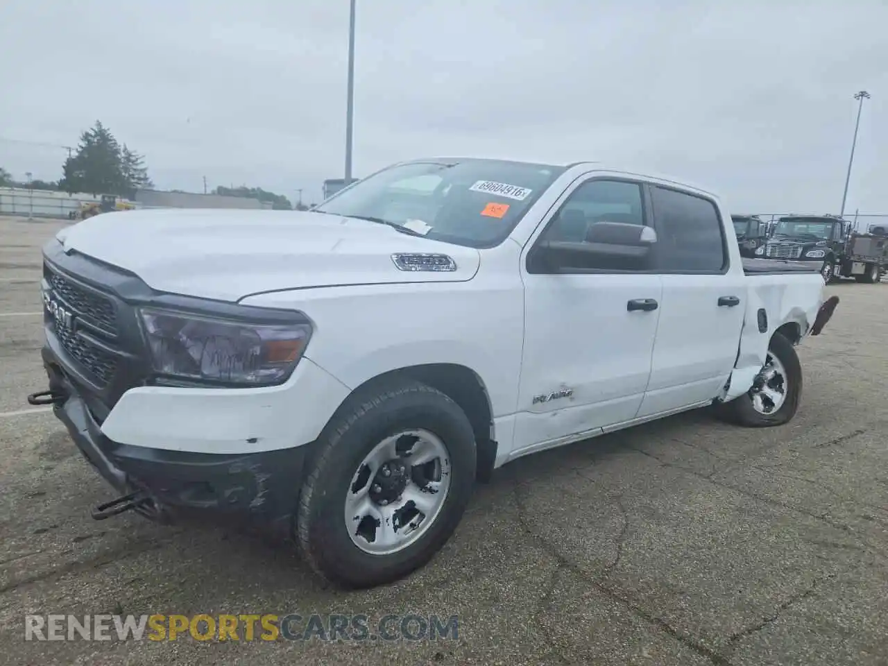 1 Photograph of a damaged car 1C6SRFGTXNN394514 RAM 1500 2022