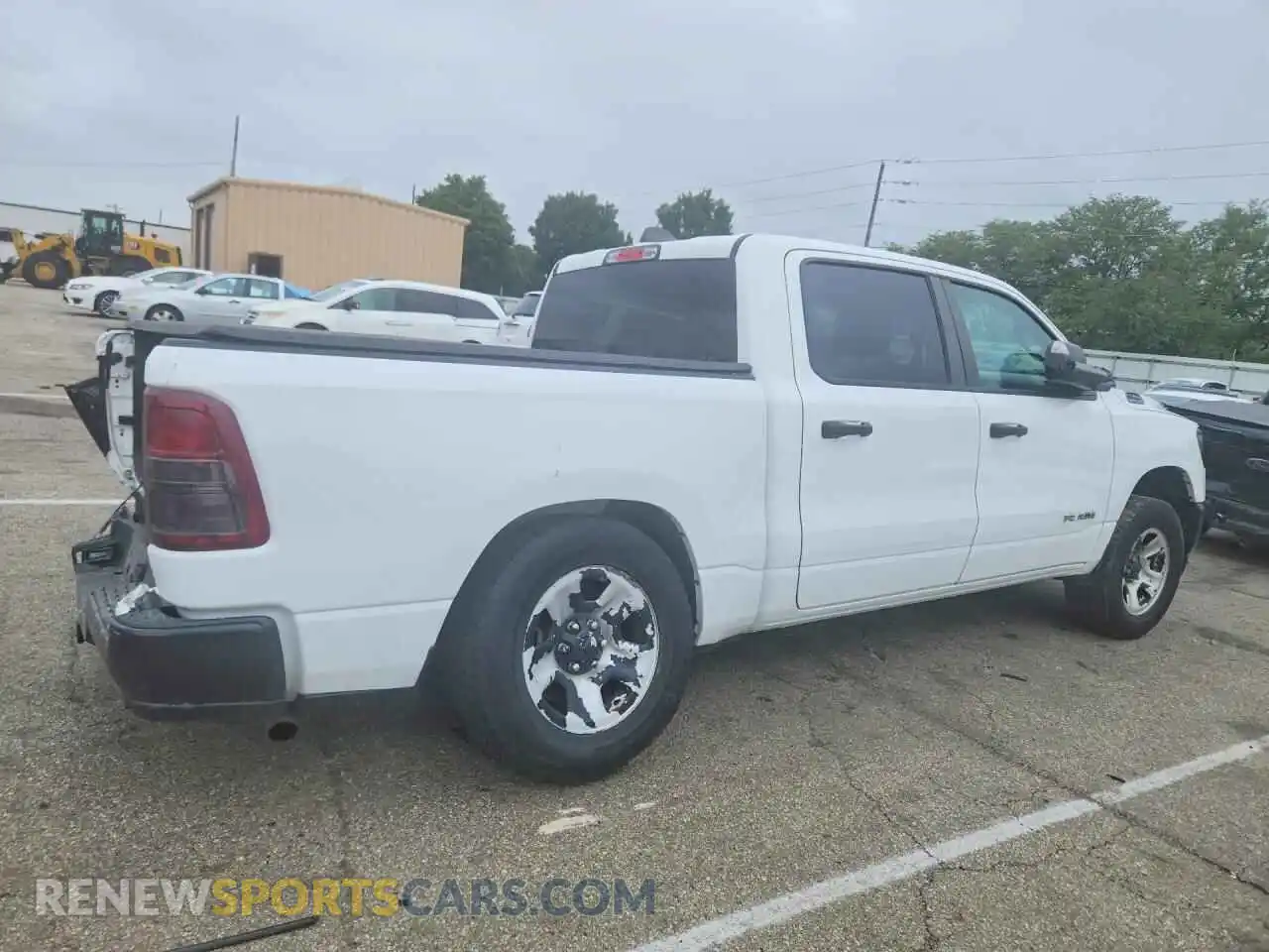 3 Photograph of a damaged car 1C6SRFGTXNN394514 RAM 1500 2022
