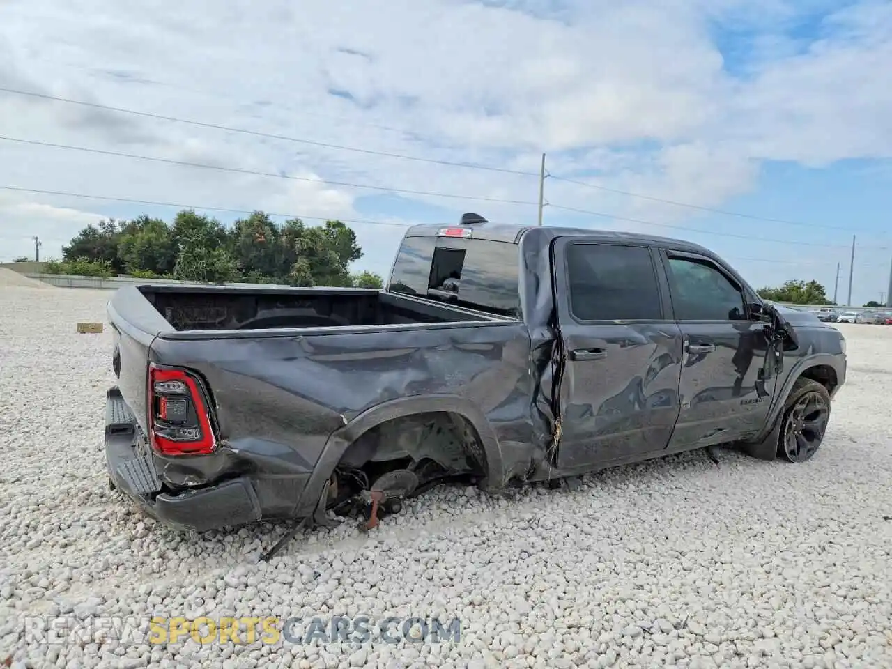 3 Photograph of a damaged car 1C6SRFHT0NN249884 RAM 1500 2022