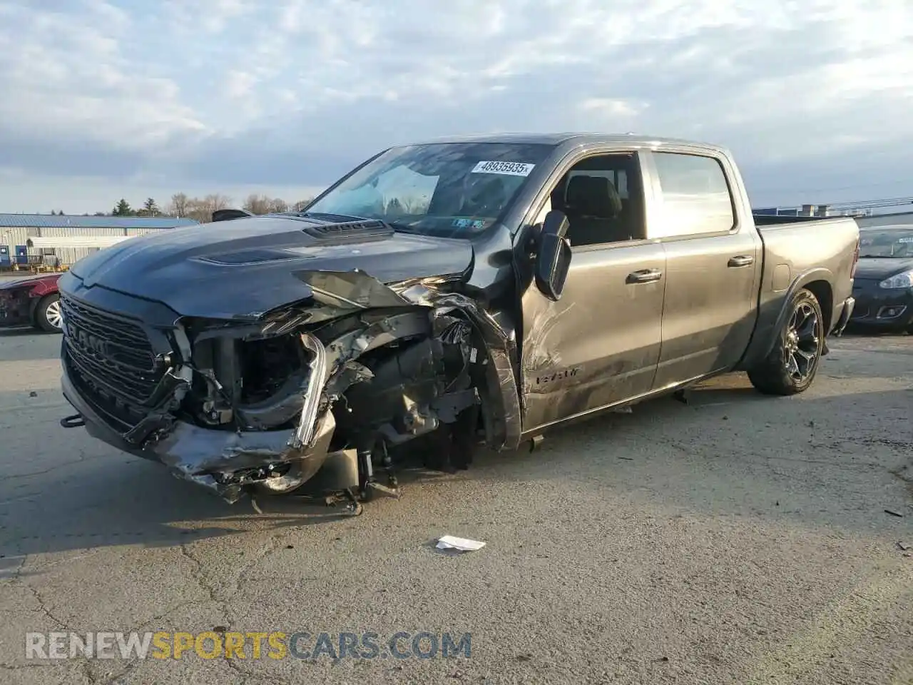 1 Photograph of a damaged car 1C6SRFHT0NN457148 RAM 1500 2022