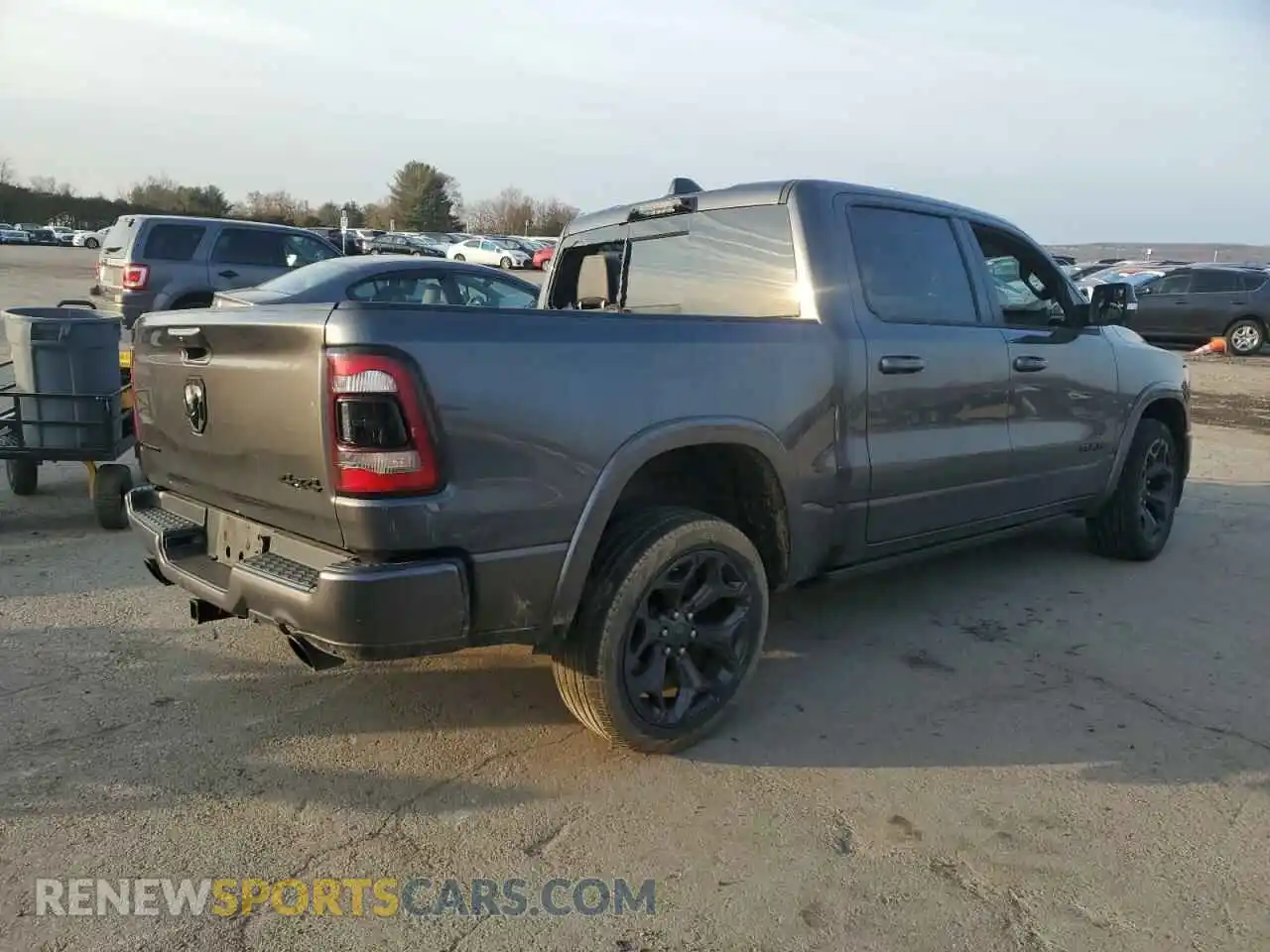 3 Photograph of a damaged car 1C6SRFHT0NN457148 RAM 1500 2022