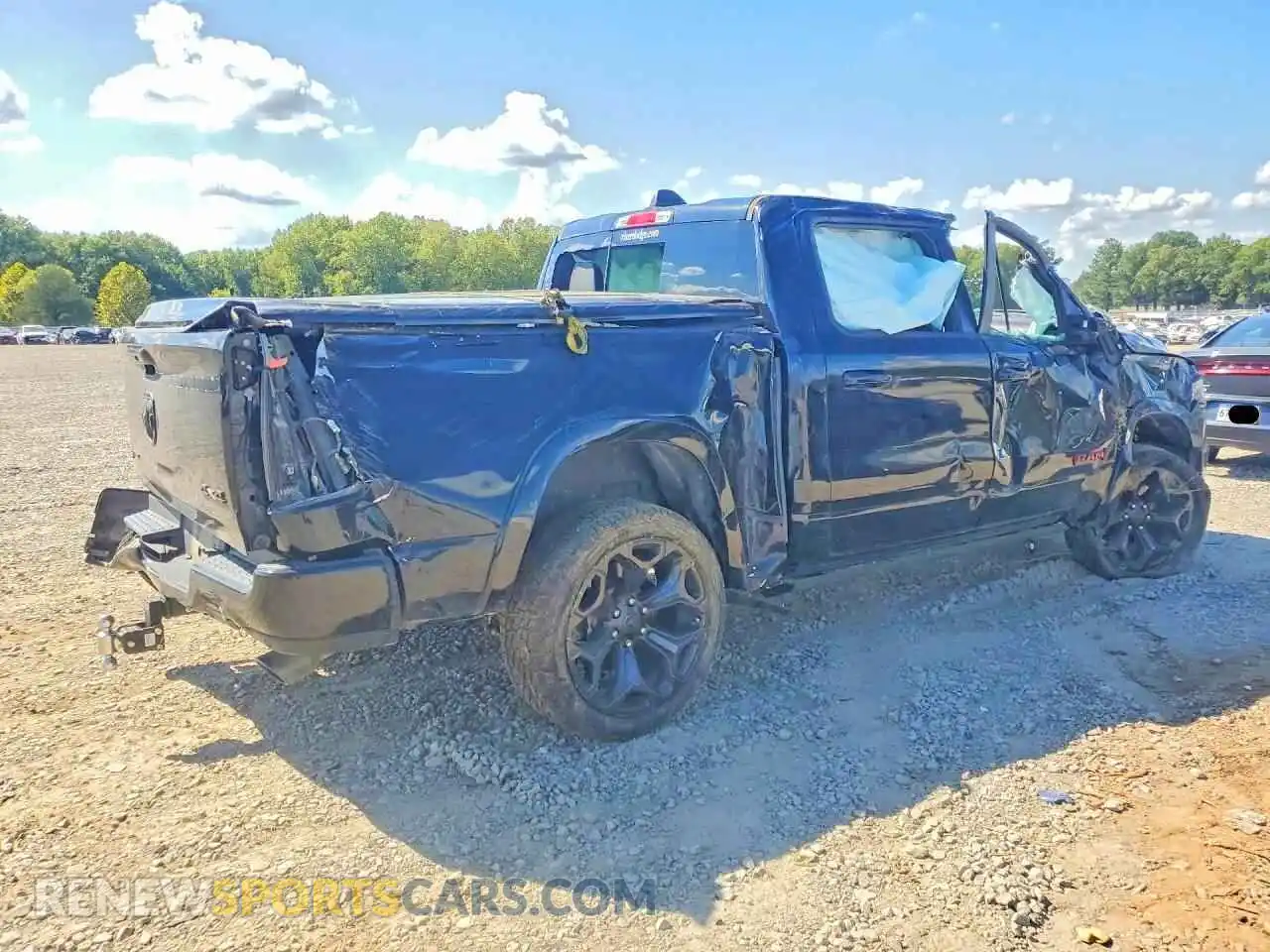 3 Photograph of a damaged car 1C6SRFHT4NN360583 RAM 1500 2022