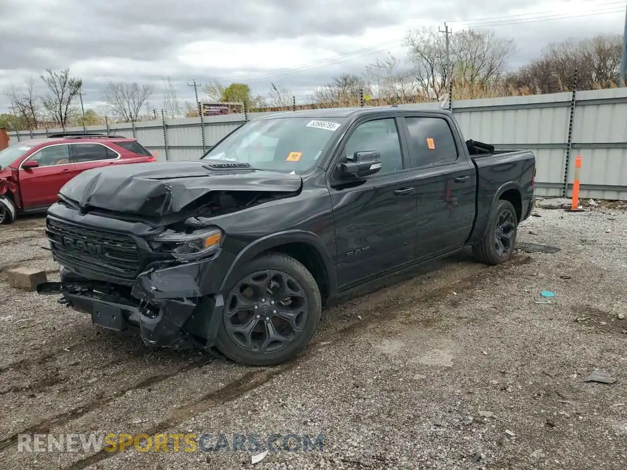1 Photograph of a damaged car 1C6SRFHT8NN380674 RAM 1500 2022