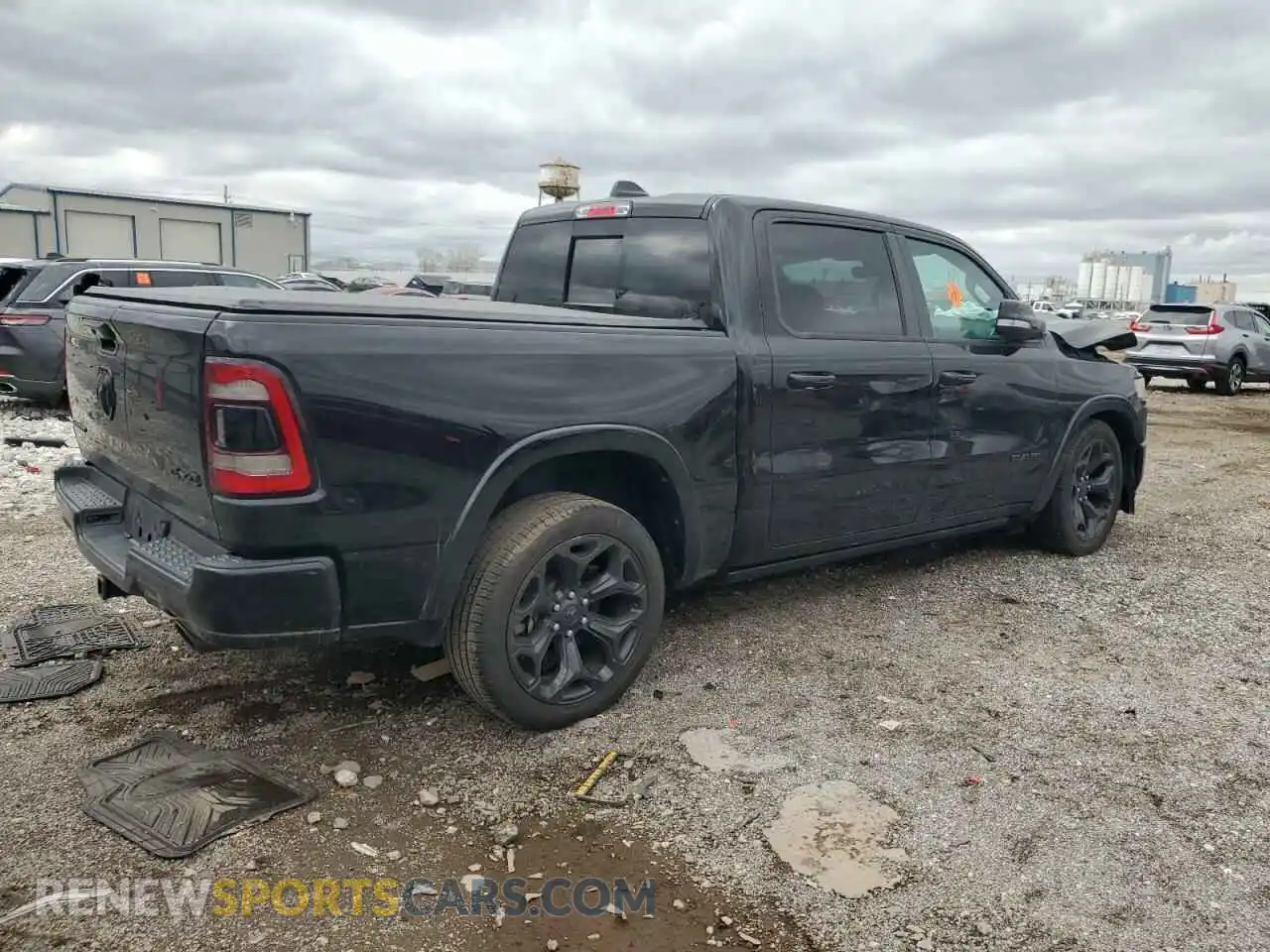 3 Photograph of a damaged car 1C6SRFHT8NN380674 RAM 1500 2022