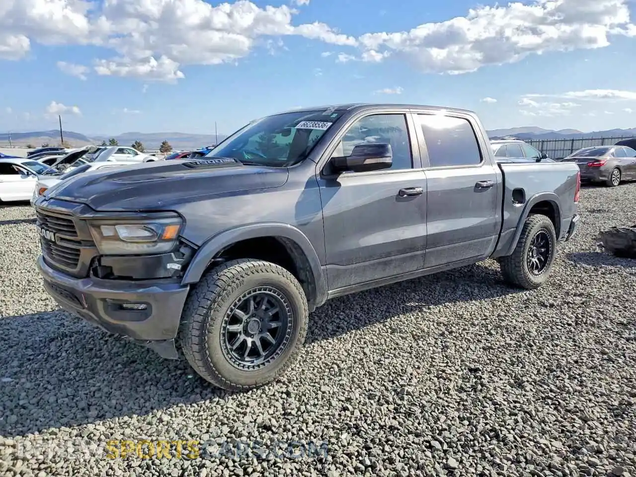 1 Photograph of a damaged car 1C6SRFJM7NN380491 RAM 1500 2022