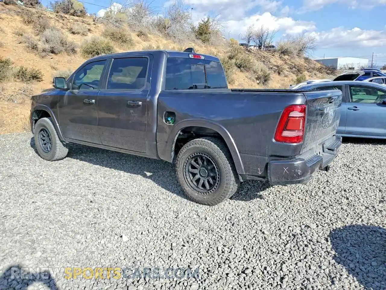 2 Photograph of a damaged car 1C6SRFJM7NN380491 RAM 1500 2022