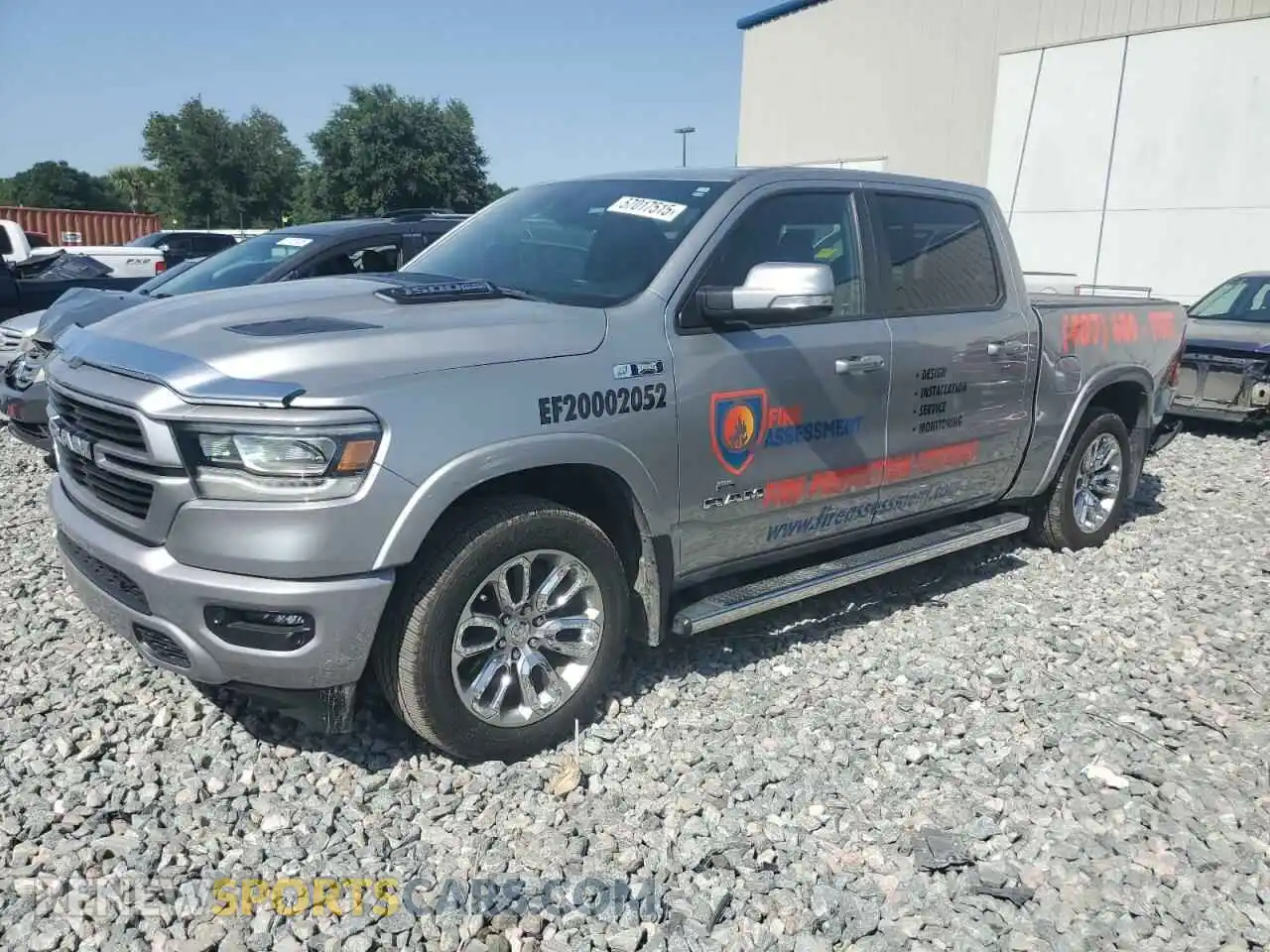 1 Photograph of a damaged car 1C6SRFJT0NN225045 RAM 1500 2022