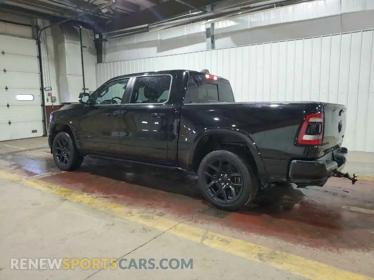 2 Photograph of a damaged car 1C6SRFJT1NN322576 RAM 1500 2022