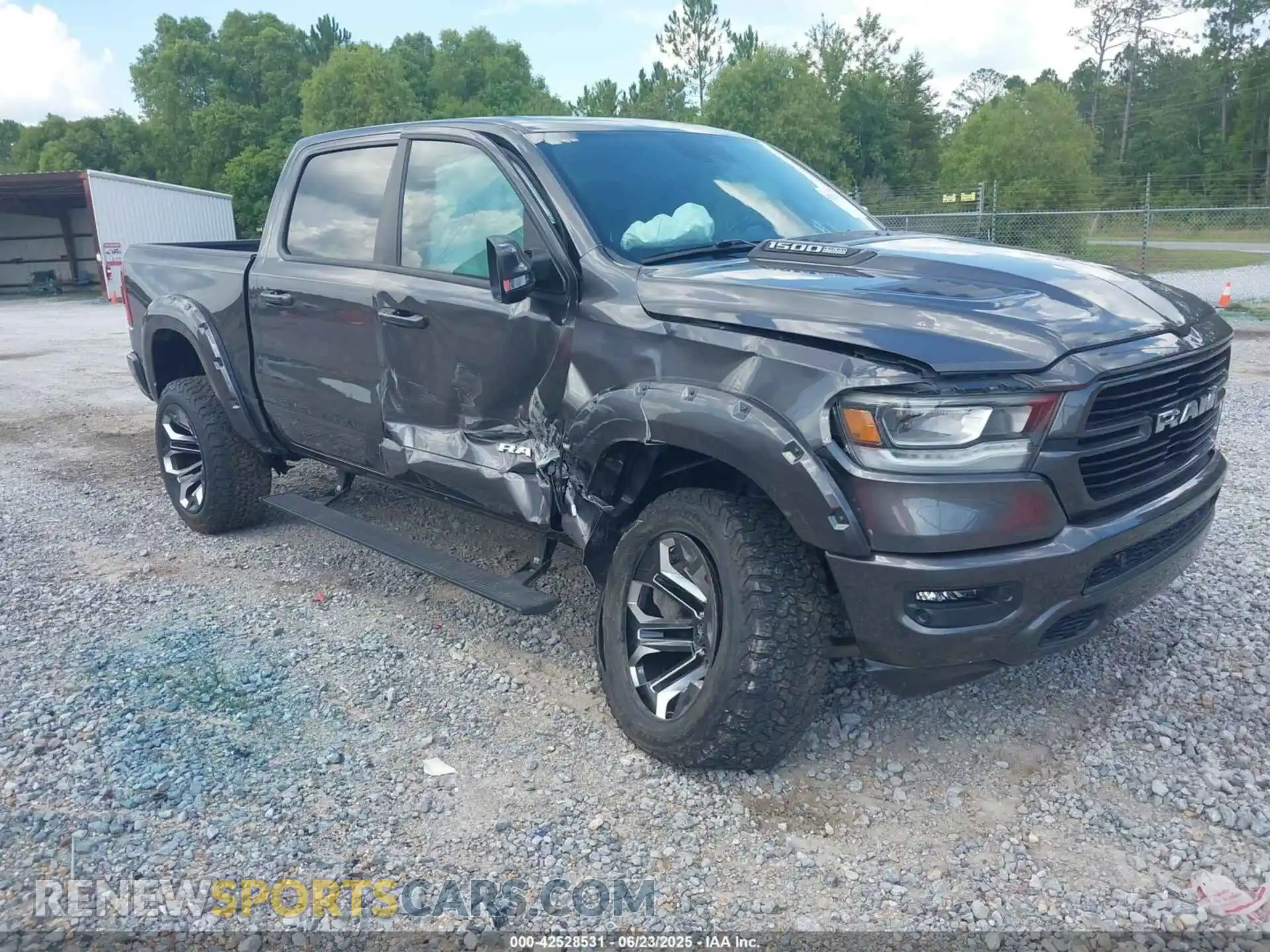1 Photograph of a damaged car 1C6SRFJT2NN111063 RAM 1500 2022