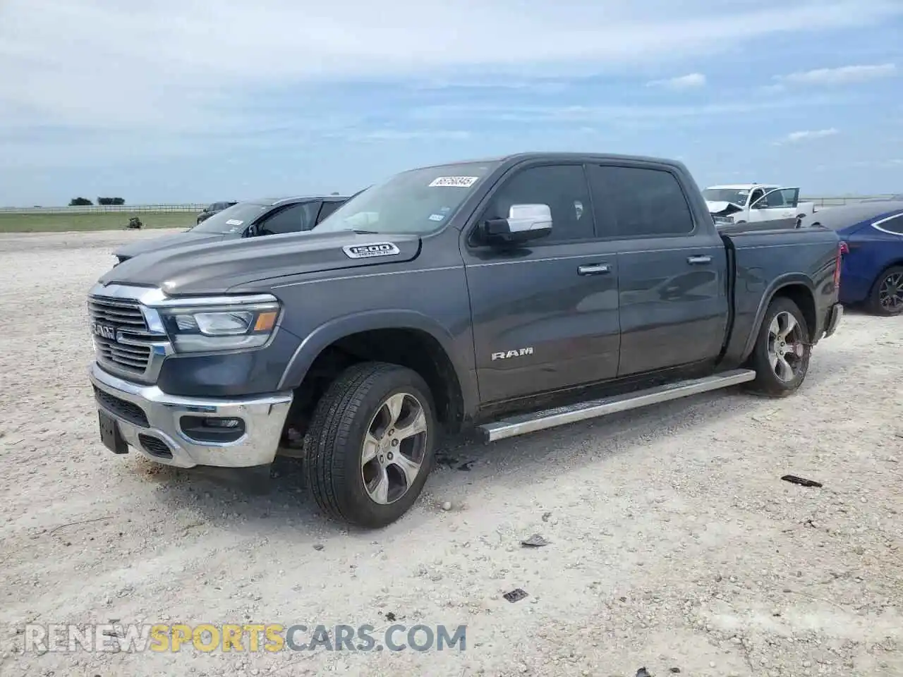 1 Photograph of a damaged car 1C6SRFJT2NN310663 RAM 1500 2022