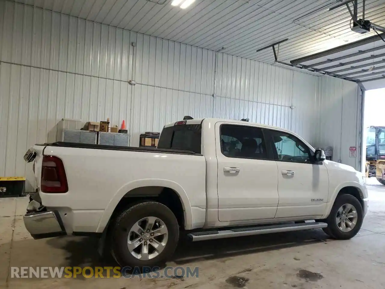 3 Photograph of a damaged car 1C6SRFJT2NN394502 RAM 1500 2022