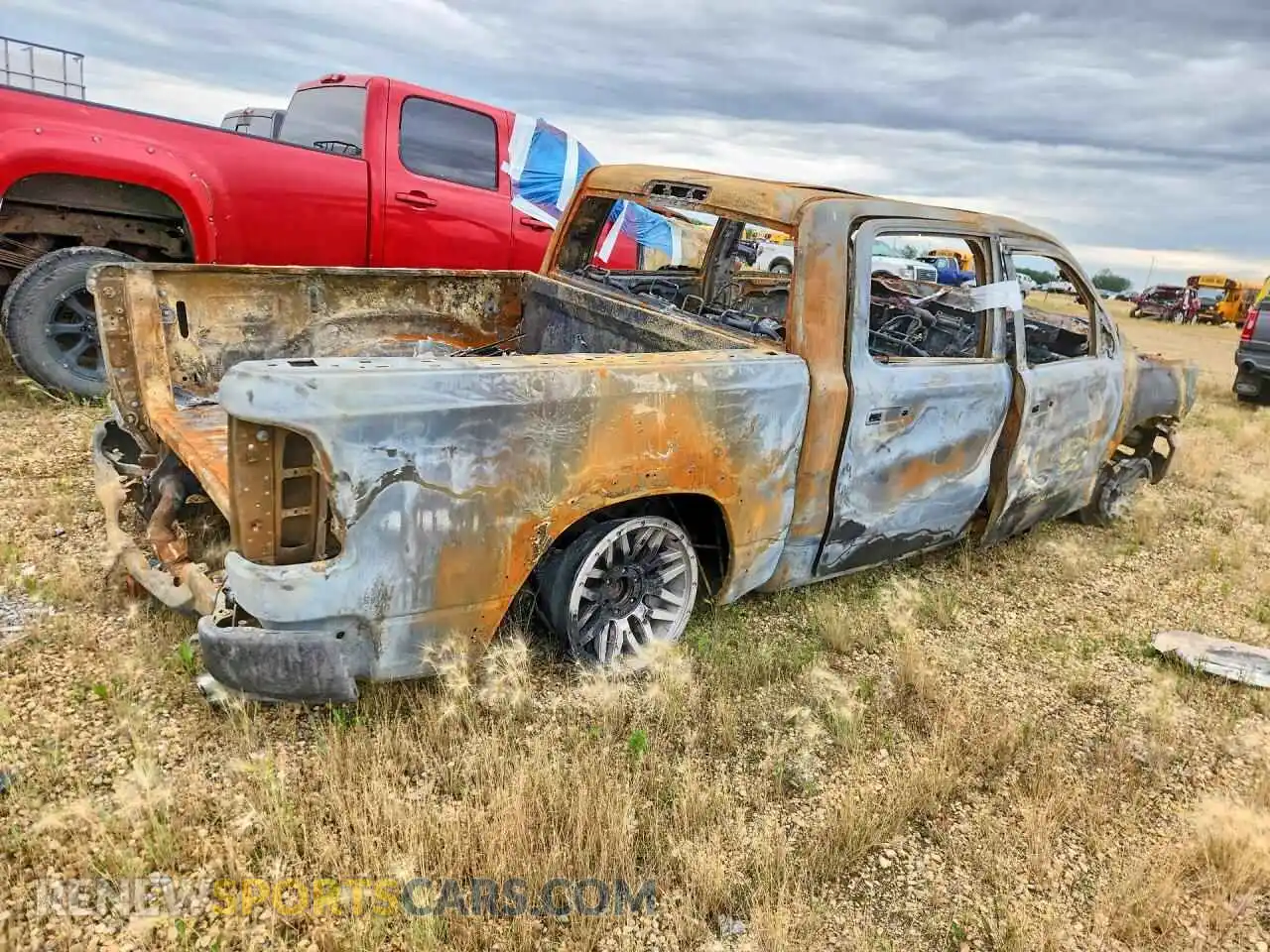 3 fotografías del automóvil dañado 1C6SRFJT3NN309733 RAM 1500 2022