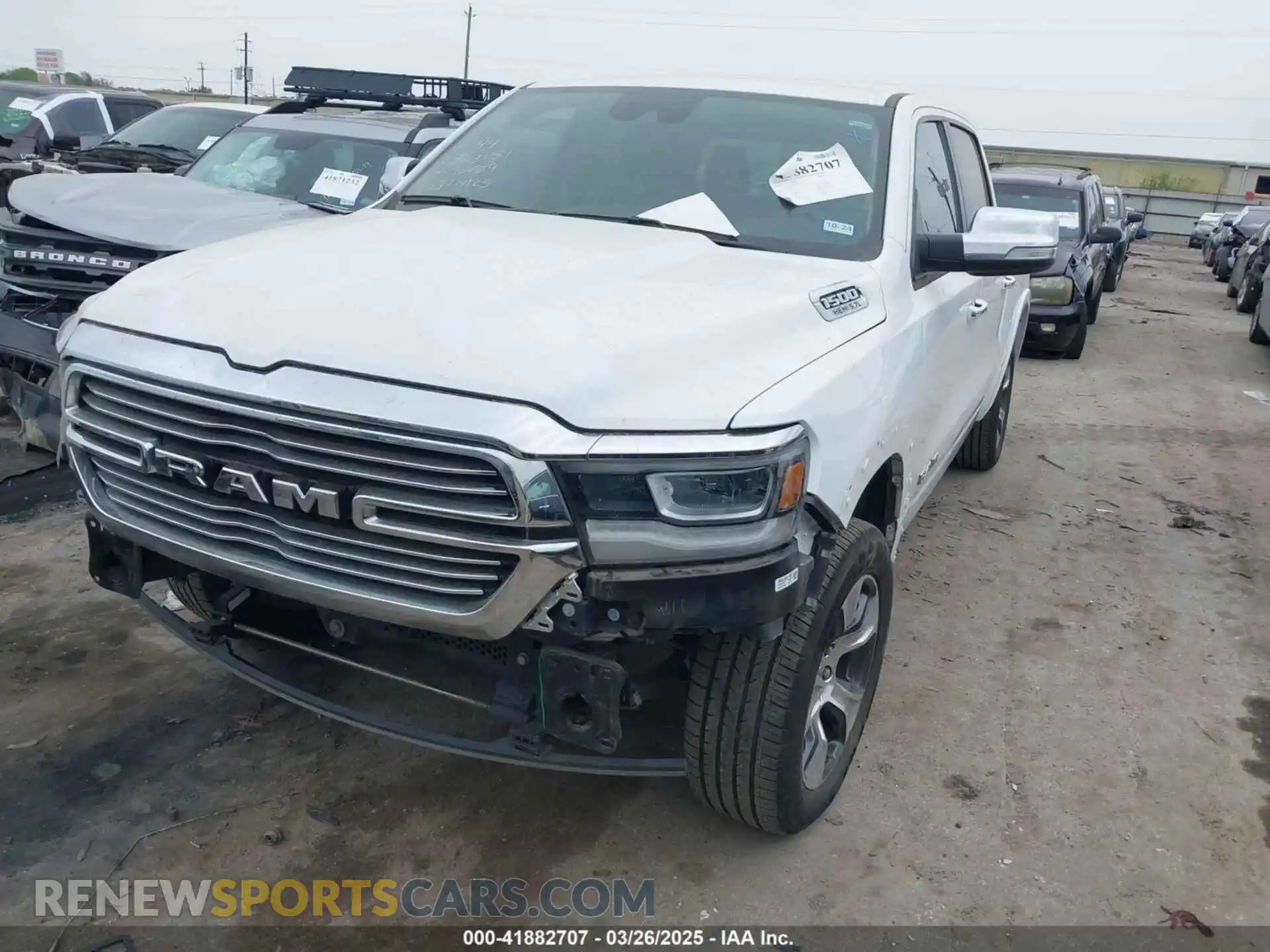 2 fotografías del automóvil dañado 1C6SRFJT4NN330459 RAM 1500 2022