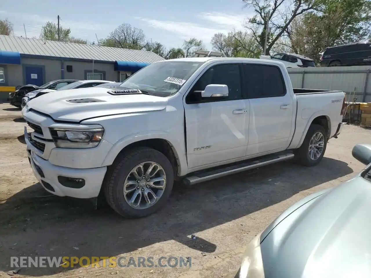 1 Photograph of a damaged car 1C6SRFJT4NN471161 RAM 1500 2022