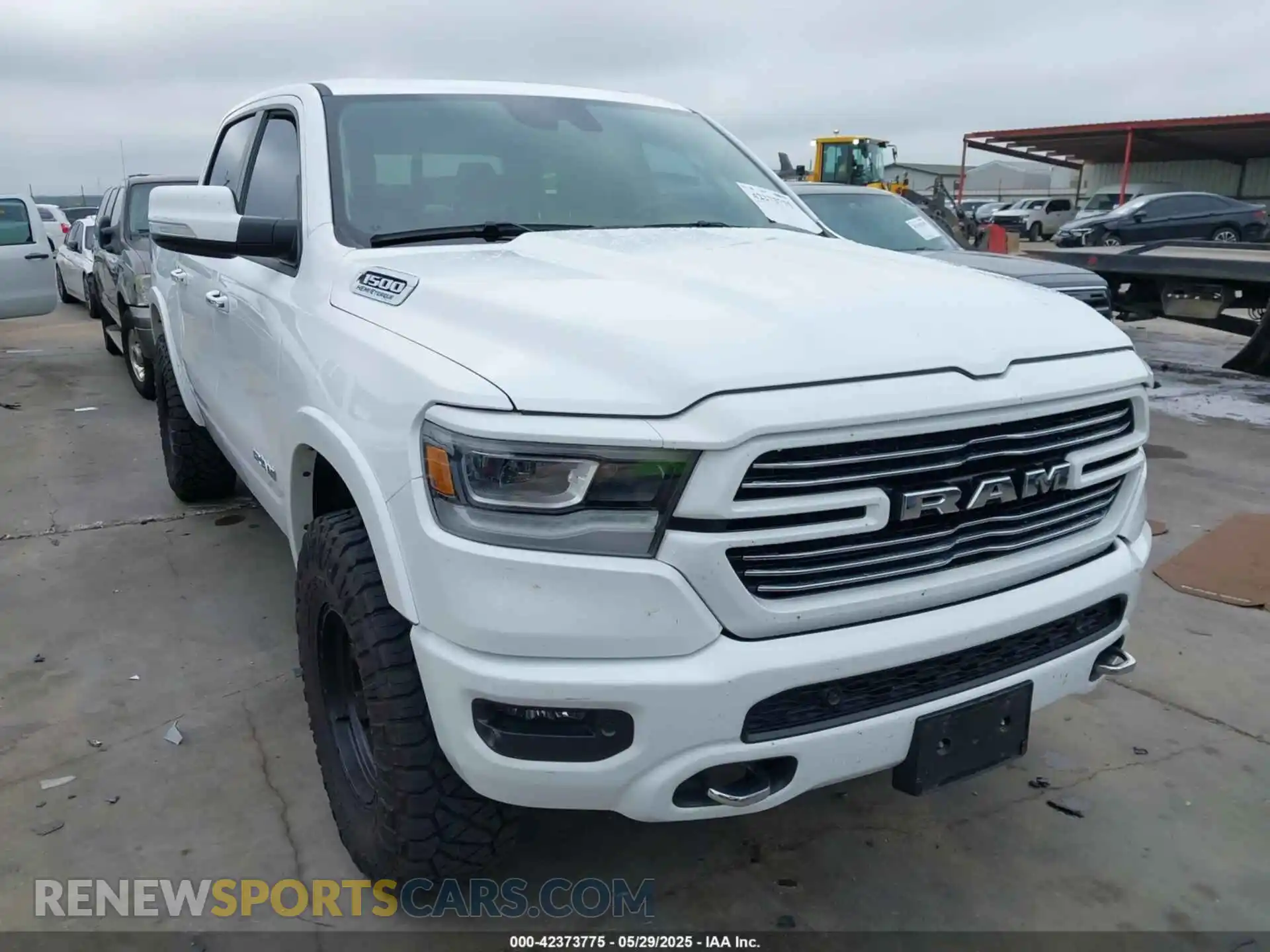 1 Photograph of a damaged car 1C6SRFJT6NN128450 RAM 1500 2022