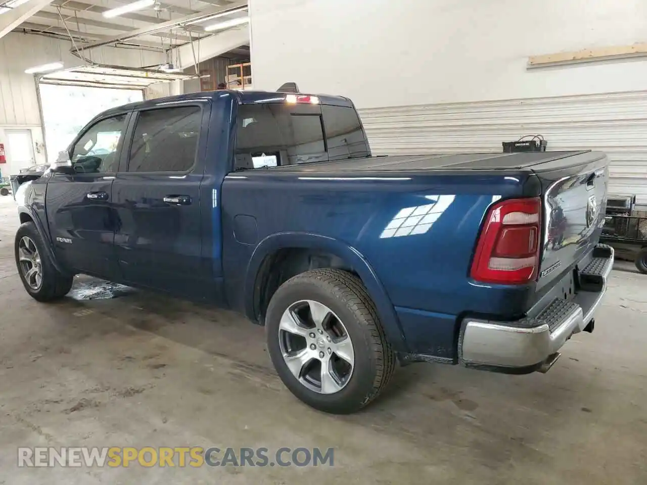 2 Photograph of a damaged car 1C6SRFJT6NN186607 RAM 1500 2022