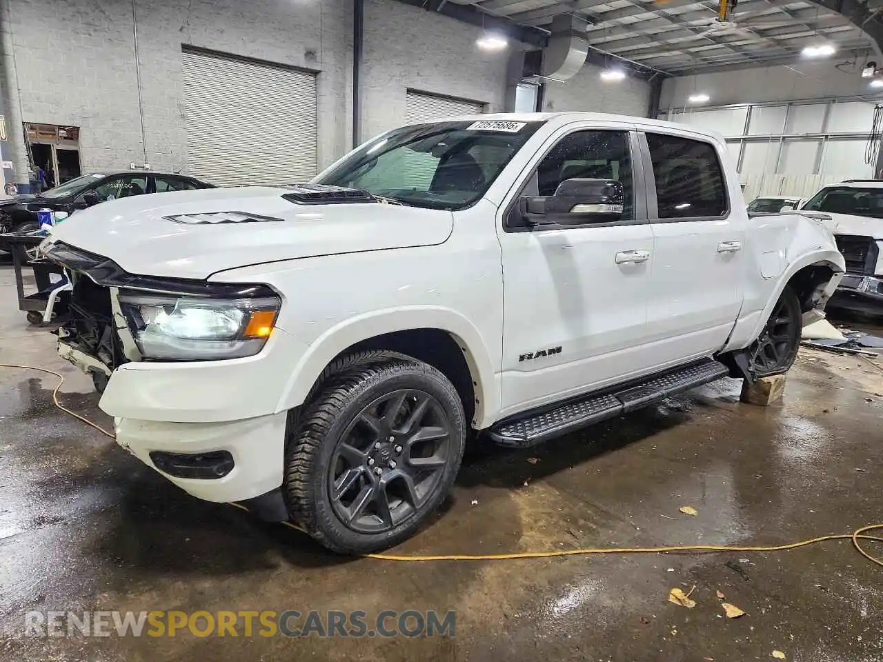 1 Photograph of a damaged car 1C6SRFJT7NN174594 RAM 1500 2022