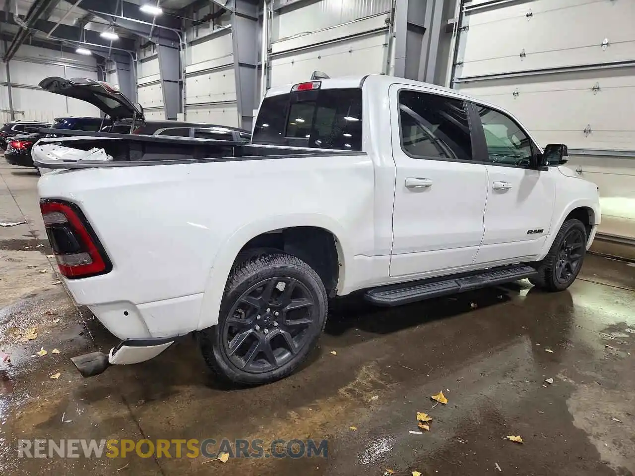 3 Photograph of a damaged car 1C6SRFJT7NN174594 RAM 1500 2022