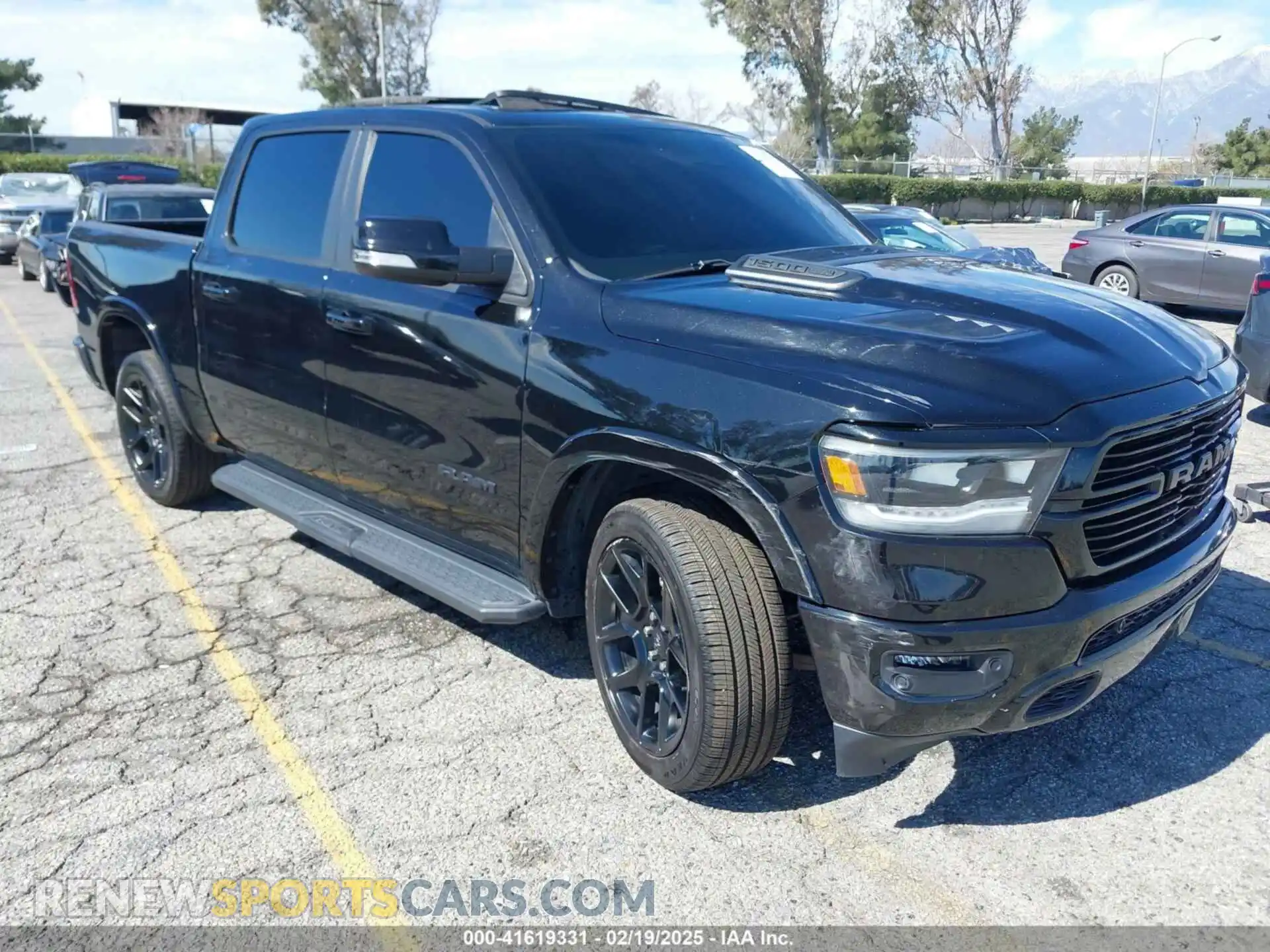 1 Photograph of a damaged car 1C6SRFJTXNN102742 RAM 1500 2022