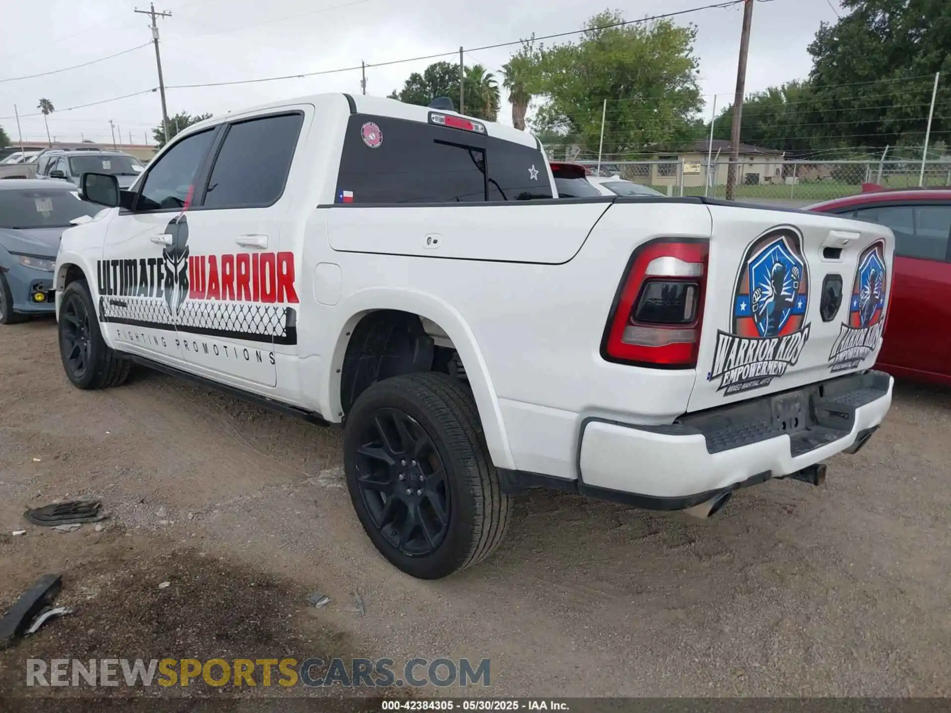 3 Photograph of a damaged car 1C6SRFJTXNN129844 RAM 1500 2022