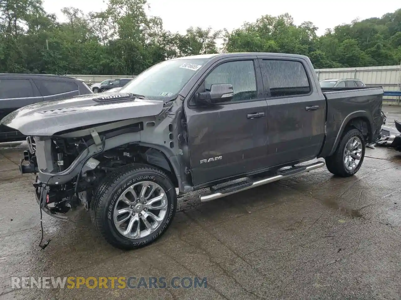 1 Photograph of a damaged car 1C6SRFJTXNN447995 RAM 1500 2022