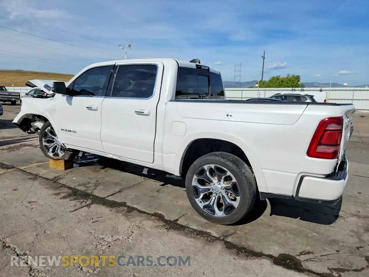 2 fotografías del automóvil dañado 1C6SRFKMXNN138440 RAM 1500 2022