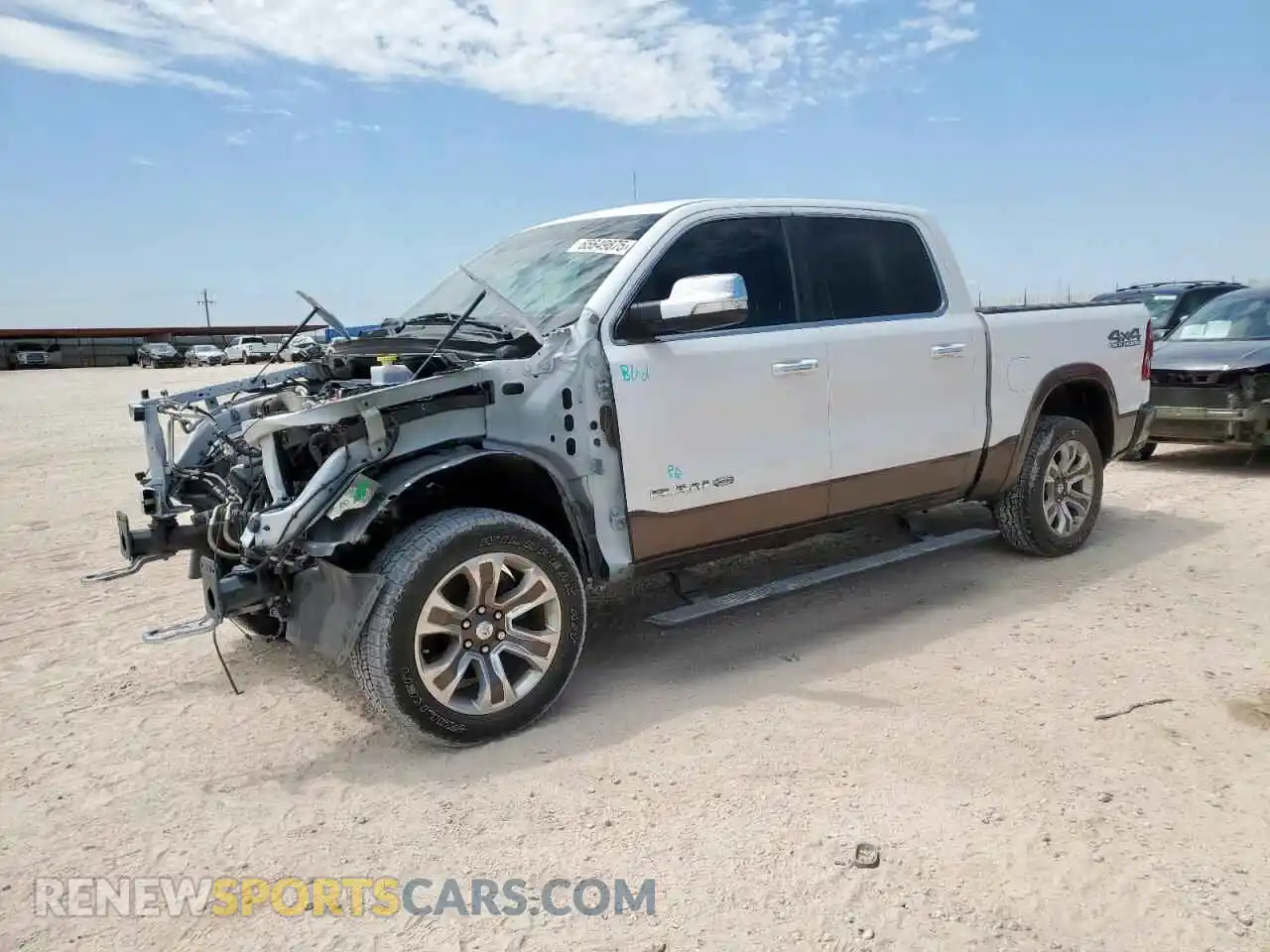 1 Photograph of a damaged car 1C6SRFKT2NN308278 RAM 1500 2022