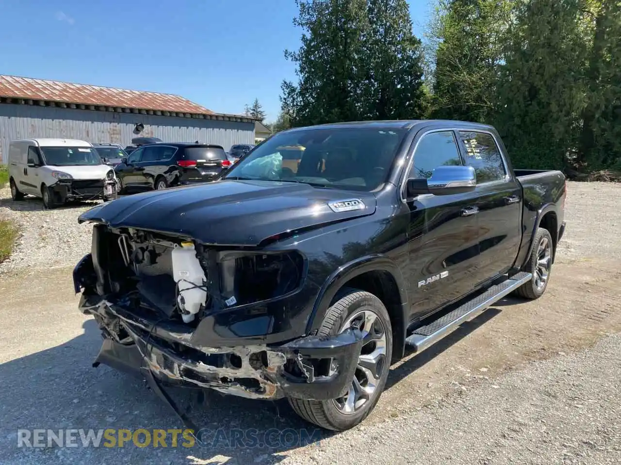 1 Photograph of a damaged car 1C6SRFKT4NN183977 RAM 1500 2022