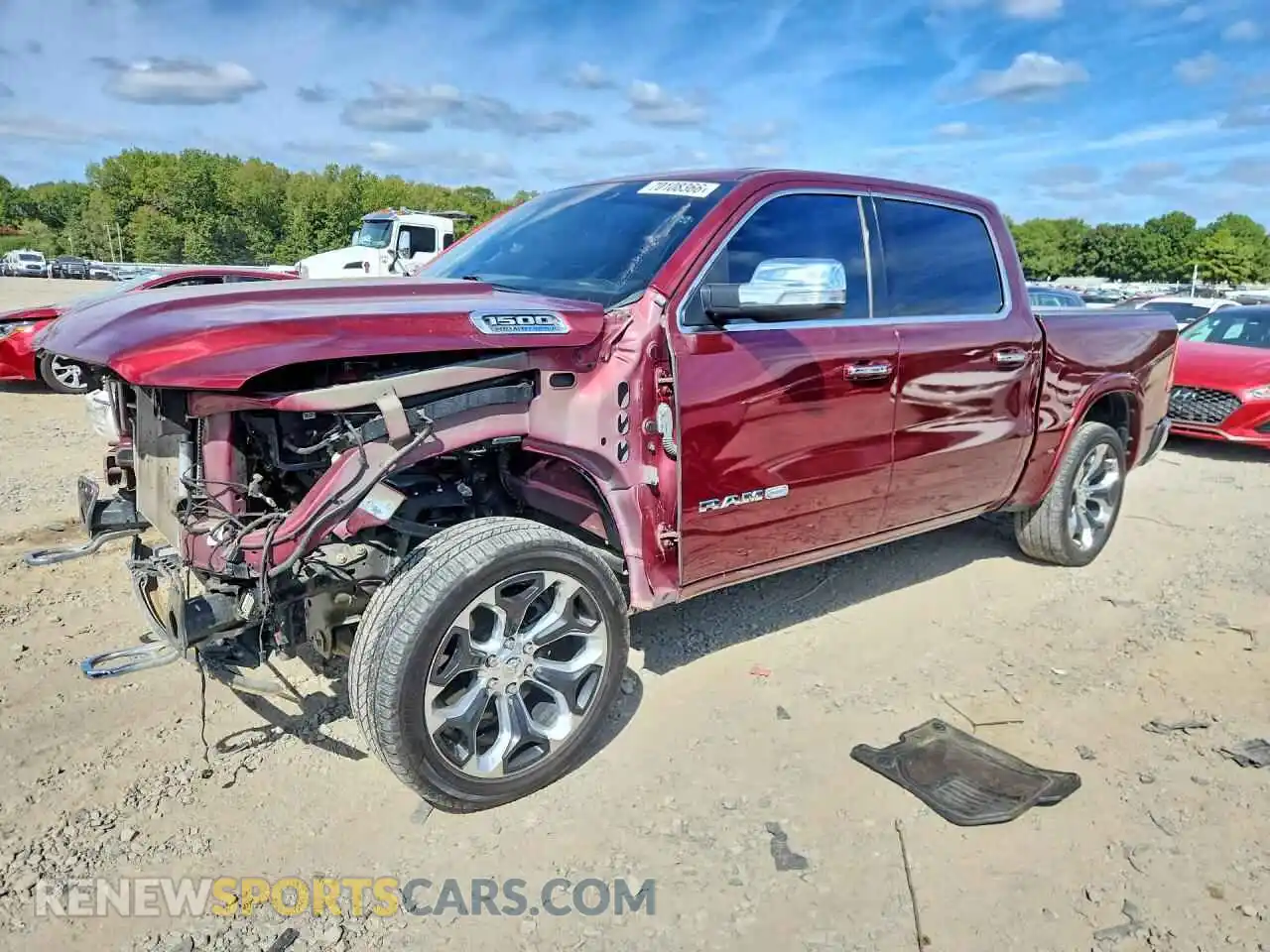 1 Photograph of a damaged car 1C6SRFKT8NN352303 RAM 1500 2022