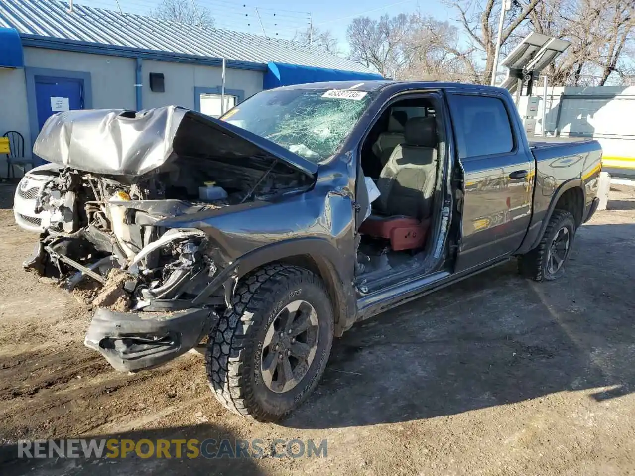 1 Photograph of a damaged car 1C6SRFLM3NN204700 RAM 1500 2022