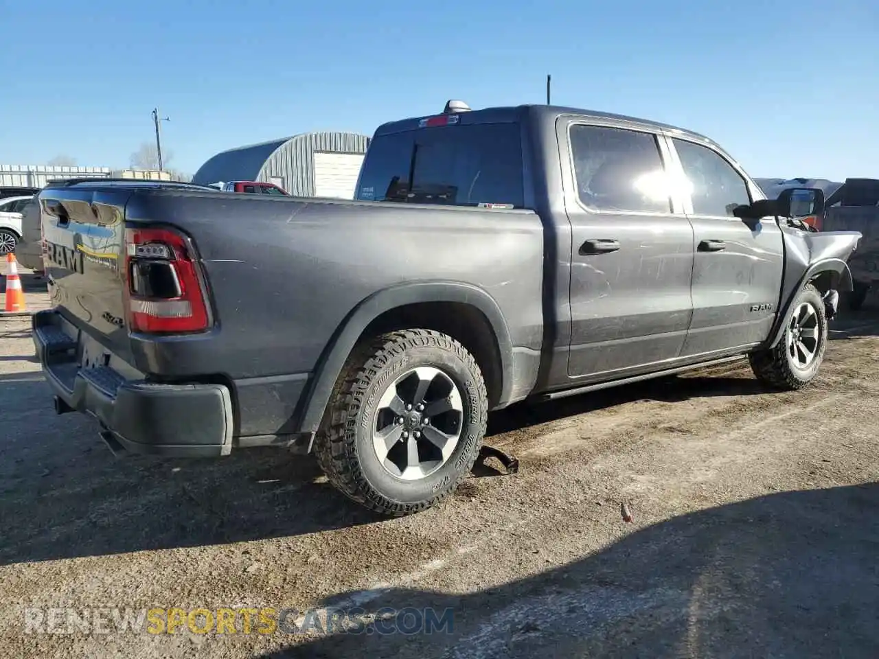 3 Photograph of a damaged car 1C6SRFLM3NN204700 RAM 1500 2022