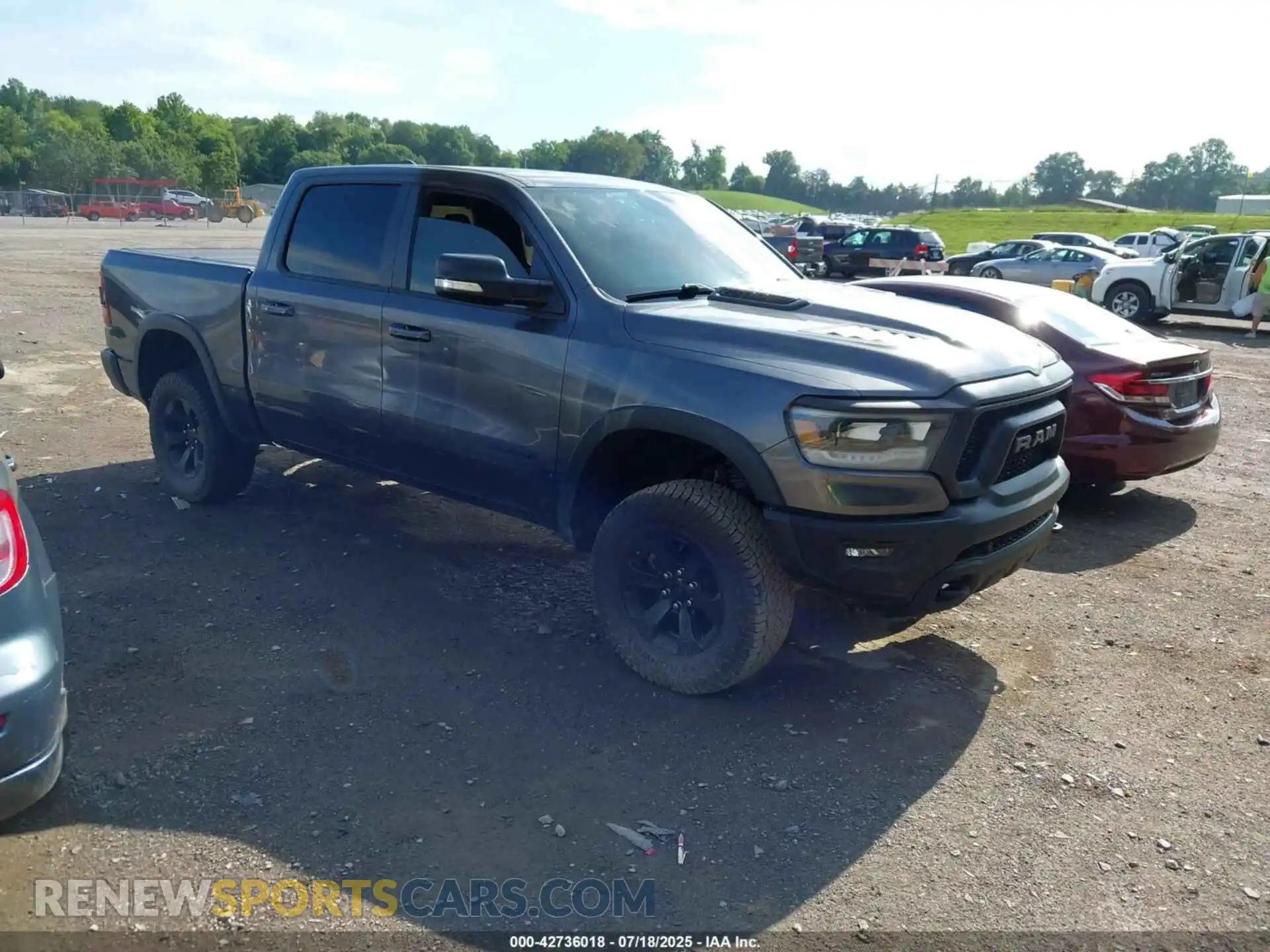 1 Photograph of a damaged car 1C6SRFLM4NN281057 RAM 1500 2022