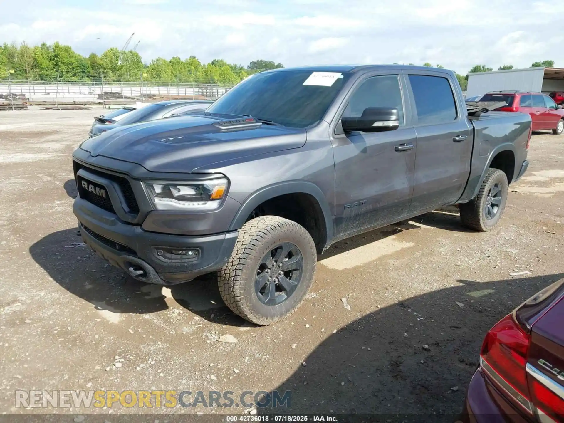 2 Photograph of a damaged car 1C6SRFLM4NN281057 RAM 1500 2022