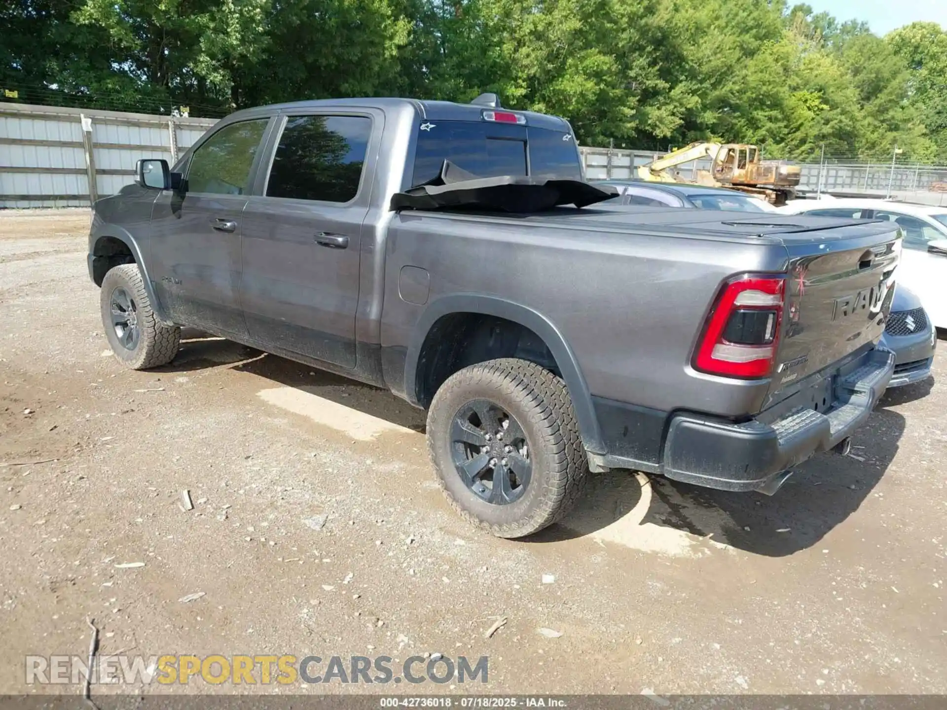 3 Photograph of a damaged car 1C6SRFLM4NN281057 RAM 1500 2022