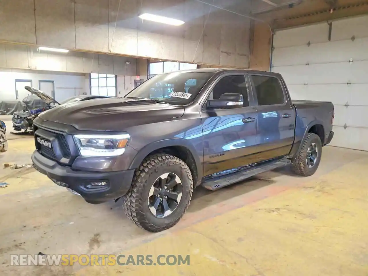 1 Photograph of a damaged car 1C6SRFLM6NN134500 RAM 1500 2022