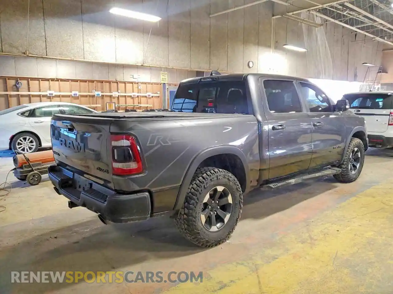 3 Photograph of a damaged car 1C6SRFLM6NN134500 RAM 1500 2022