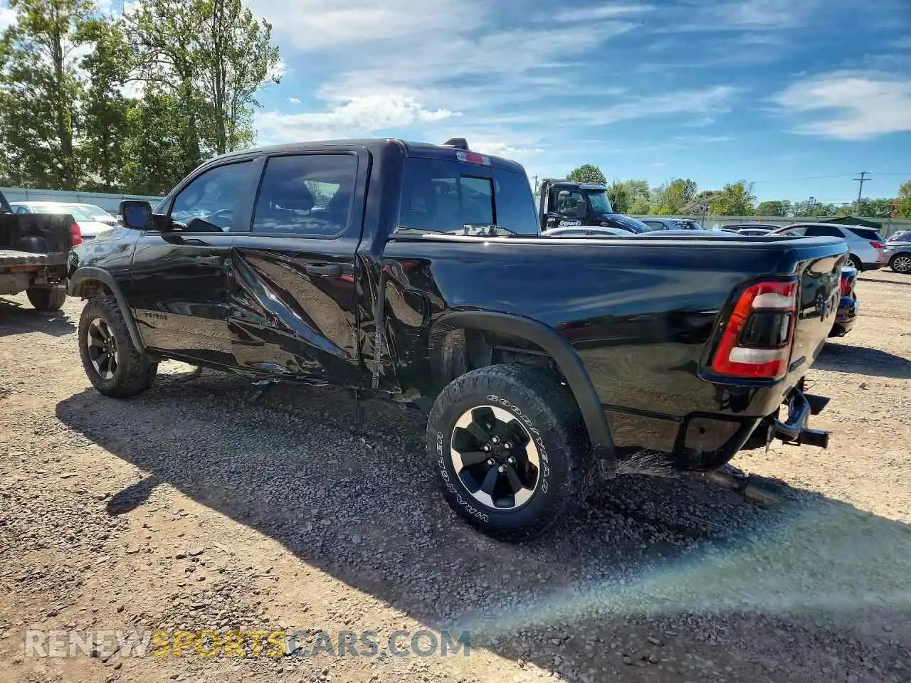 2 fotografías del automóvil dañado 1C6SRFLT0NN352665 RAM 1500 2022