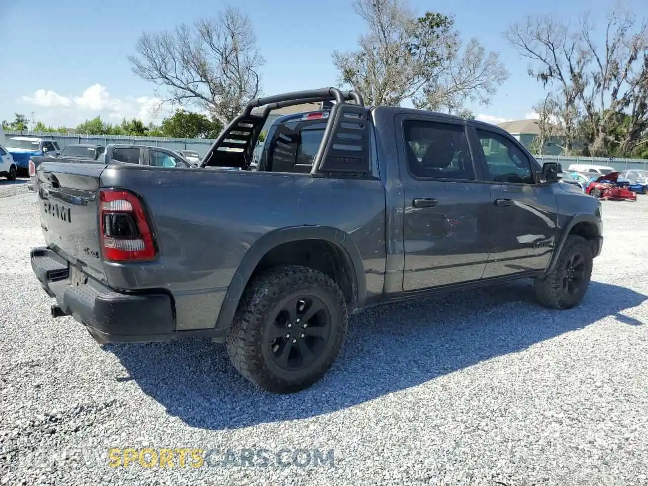 3 Photograph of a damaged car 1C6SRFLT1NN322669 RAM 1500 2022