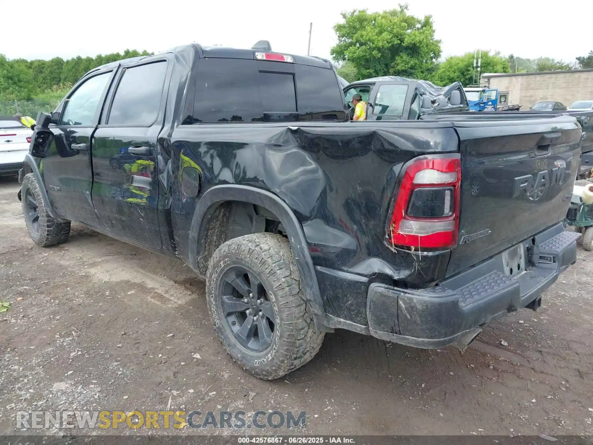 3 Photograph of a damaged car 1C6SRFLT2NN398031 RAM 1500 2022