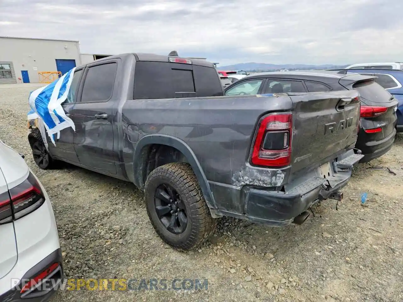 2 Photograph of a damaged car 1C6SRFLT4NN310175 RAM 1500 2022