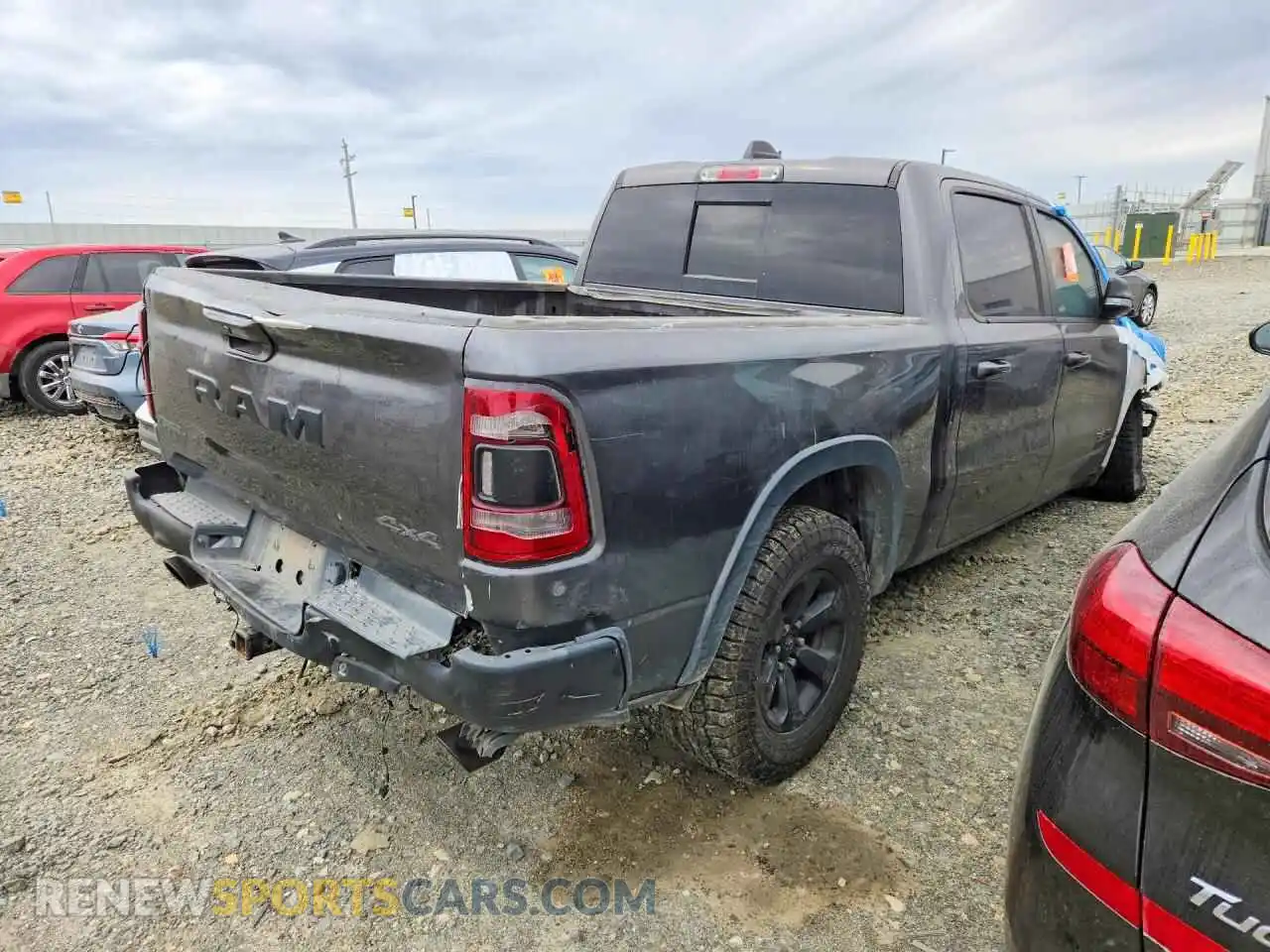 3 Photograph of a damaged car 1C6SRFLT4NN310175 RAM 1500 2022