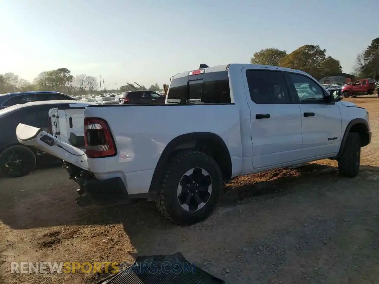 3 Photograph of a damaged car 1C6SRFLT4NN352619 RAM 1500 2022
