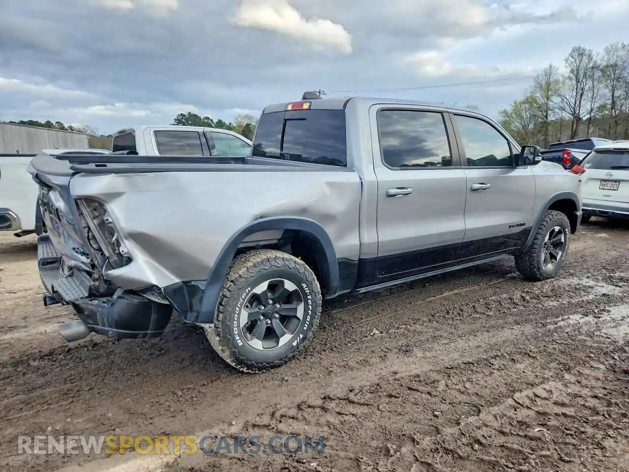 3 Photograph of a damaged car 1C6SRFLT4NN353141 RAM 1500 2022