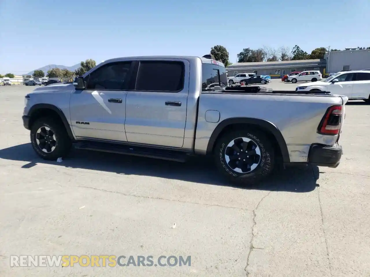 2 Photograph of a damaged car 1C6SRFLT5NN199975 RAM 1500 2022