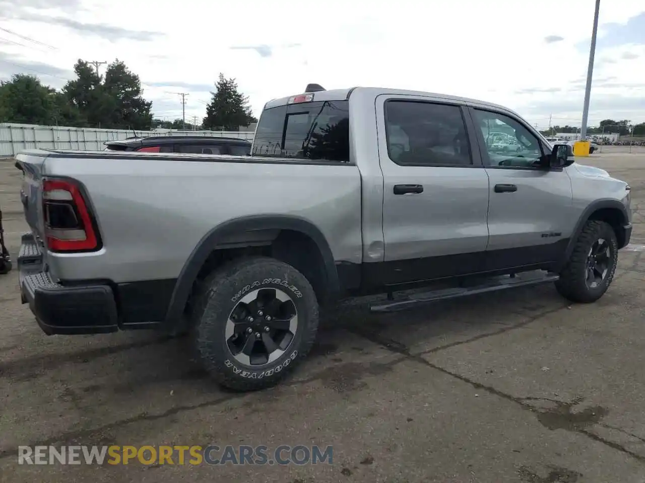3 Photograph of a damaged car 1C6SRFLT6NN238265 RAM 1500 2022